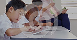 Image of financial data processing over diverse group of diverse pupils