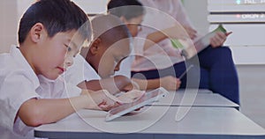 Image of financial data processing over diverse group of diverse pupils