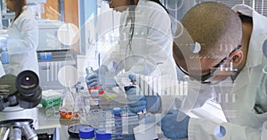 Image of financial data processing over diverse scientists working in lab