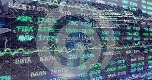 Image of financial data processing over junkyard