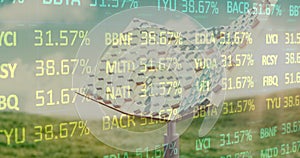 Image of financial data processing over moving cogs