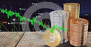 Image of financial data processing over stacks of bitcoins