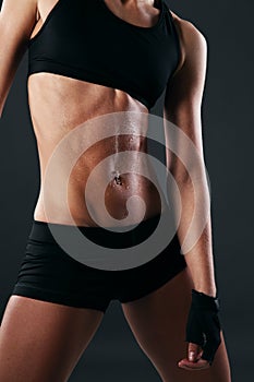 Image of fitness body sweating