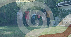 Image of flag of united states of america waving over smiling african american family