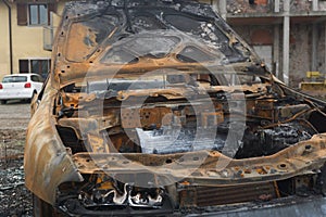 Image of fragment of burned car.