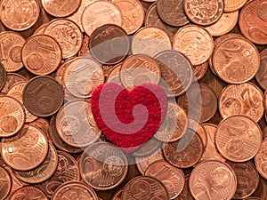 Image full of Euro cents and red heart, copper coin, one and two cents coin will be dismissed by ECB