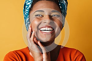 Image of funny african american woman posing and laughing on camera
