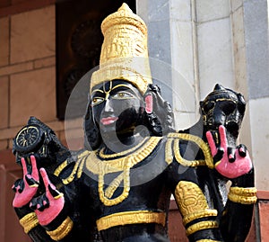 Image of a god in black at an ISKCON temple in Delhi photo