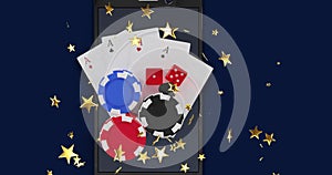 Image of gold stars falling over casino chips, playing cards, two red dice on smartphone