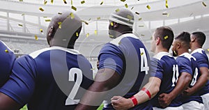 Image of golden confetti falling over a multi-ethnic team standing in a row on a pitch digital compo