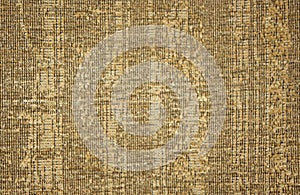 Closeup Golden Flaxen Linen Fabric Background photo