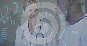 Image of graphs, loading circles and trading board, diverse female doctor talking with patient