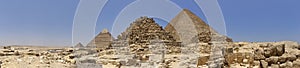 Image of great pyramid of Giza. Cairo, Egypt. In the foreground is a and small pyramids of priests. pyramids of the queens of giza