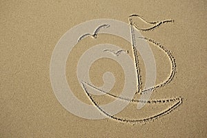 Image gulls and boat on the sand