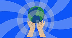 Image of hands holding globe on spiral blue background