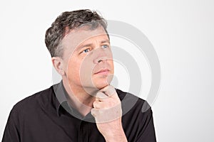 Image of a handsome man dreming pensive look up