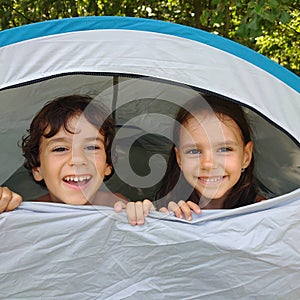 Image of happy kids in a tent