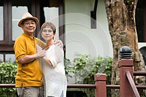 Image of happy romantic Asian senior couple outdoor in park