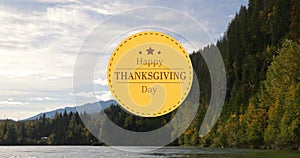 Image of happy thanksgiving day text over autumn landscape in background