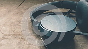 An image of a headphone on a table.