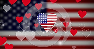 Image of hearts over flag of united states of america