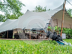 Image of huge white tent for a wedding event in the nature