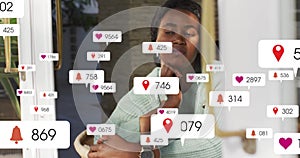 Image of icon, changing numbers in notification bars, thoughtful african american woman