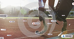 Image of icons, changing number, african american athlete walking towards race track