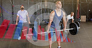 Image of interface processing data over diverse male group lifting barbell weights at gym