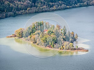 Image of an island in the Schliersee lake in autumn