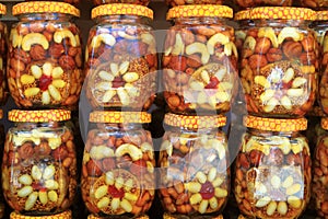 Image of a jar of honey and nuts