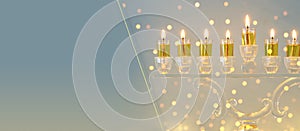 image of jewish holiday Hanukkah background with crystal menorah & x28;traditional candelabra& x29; and candles.