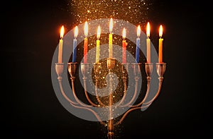 image of jewish holiday Hanukkah background with menorah & x28;traditional candelabra& x29; and burning candles