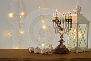 image of jewish holiday Hanukkah background with traditional spinnig top, menorah & x28;traditional candelabra& x29;