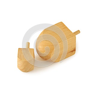 Image of jewish holiday Hanukkah symbol: wooden dreidel & x28;spinning top& x29; isolated on white