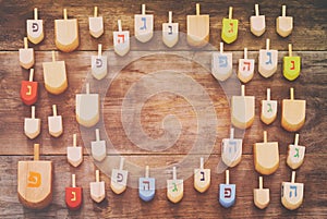 Image of jewish holiday Hanukkah with wooden dreidels