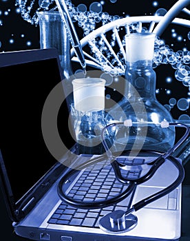 image of laptop and stethoscope close-up