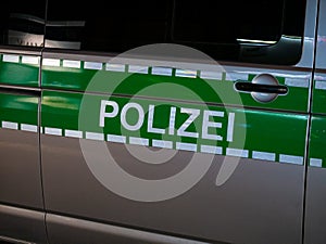 Image of letters Polizei on a german police car