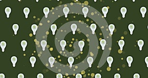 Image of lightbulbs and green spots on green background