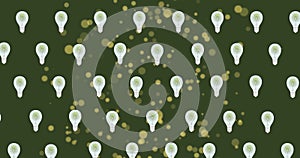 Image of lightbulbs and green spots on green background