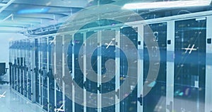 Image of lines flickering and markers moving over computer servers in background