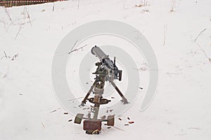 The image of machine gun Maxim in firing position