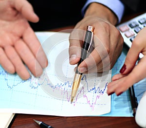 Image of male hand pointing at business