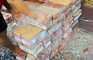 Pile of Old Used Bricks as Building Material at Construction Site.