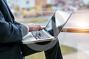 Image of man& x27;s hands typing on laptop. Selective focus. Business concept video