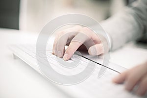 Image of man`s hands typing. Selective focus.