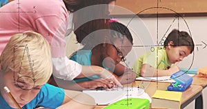 Image of math formulas over diverse pupils learning at school