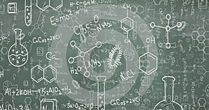 Image of mathematical and scientific drawings and formulae on blackboard