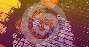 Image of meat and vegetables on barbecue