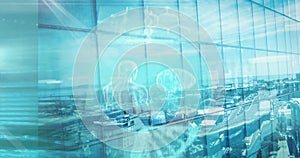 Image of medical data processing over modern building and cityscape